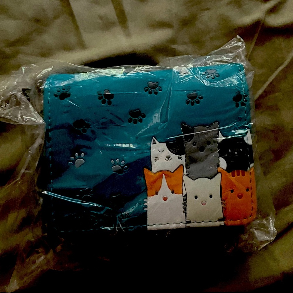 Teal colored cat design wallet